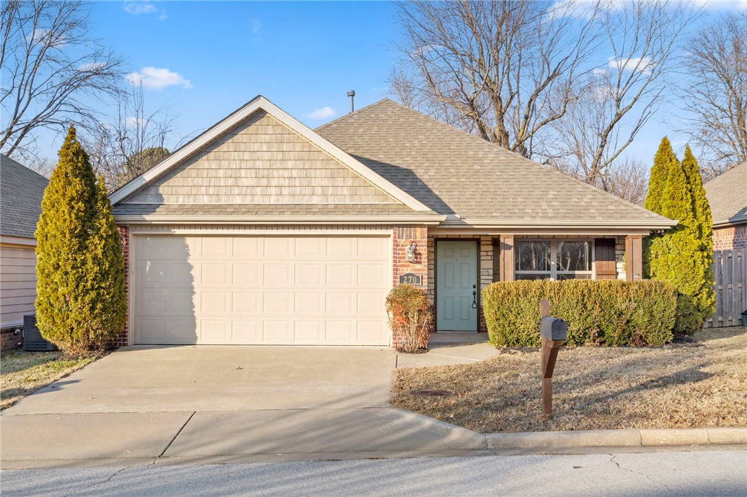 Minutes from the Razorback Greenway, U of A, Fayetteville Square, Washington Regional Medical Center, plus shopping/dining & easy I-49 access! Welcome to your centrally-located 3 bed/2 bath all-brick home right in the heart of Fayetteville! Beautiful crown moulding and decorative archways highlight the completely open living, kitchen and dining room. Enjoy the warmth of the gas log fireplace in the living room with raised ceiling or prepare a meal in the kitchen that includes granite countertops (including the island with bar seating area) and stainless steel appliances (plus, fridge is also included!). New carpet in all bedrooms, new paint throughout interior and on front door. Primary bedroom has tray ceiling and crown moulding throughout. Primary bathroom includes jetted tub and spacious closet. Relax on your covered back porch...or your covered front porch! Back porch has gas line for grill. Keypad on Garage door for easy access. Security system already wired in! New Roof in 2020!
