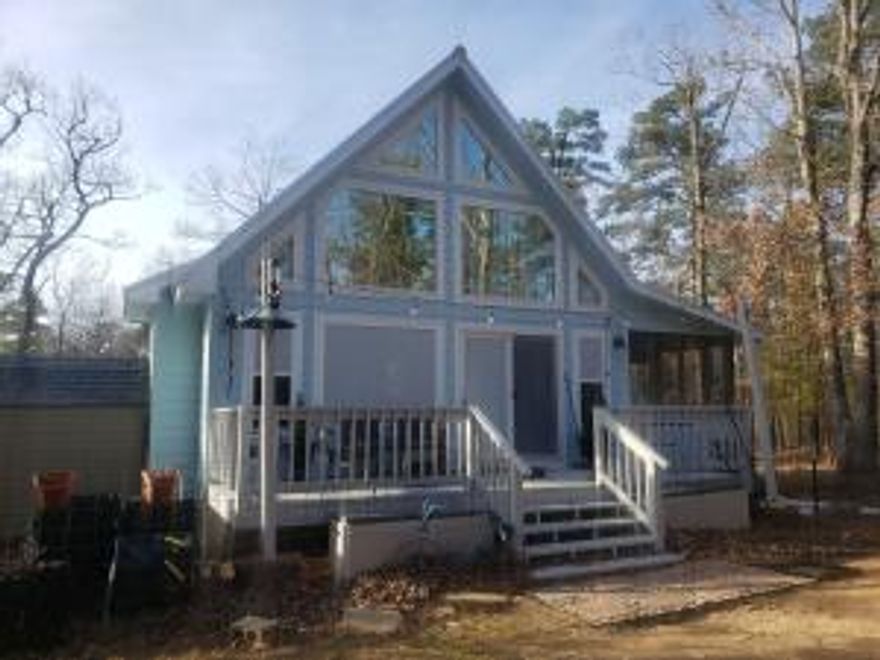 Here is a rare opportunity to acquire your very own house on top of Mt Nebo. This doll house was built in 2016 and offers 1 bedroom with a loft. The loft will fit a king or 3 twins. The bathroom has an amazing walk in shower. There is also a screened in porch to enjoy as well as the front porch. The lot is 150 x 50 and is completely fenced for dogs. The house is very cozy and designed to utilize the space.