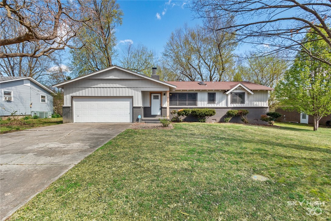 As good as New! Walking distance to Downtown Rogers, this newly remodeled gem offers plenty of room family living and entertainment. Big fenced in backyard with lots of mature trees! This 4bd/2.5ba has new electric, plumbing, flooring, lighting, granite countertops and paint! Newer furnace and HVAC as of 2016. Gorgeous double fireplace. Brand new laundry room/mud room. Call for appointment today…