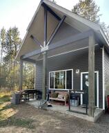 Situated on a generous 1.59-acre plot in a rural setting, this delightful two-story residence features a bright and airy layout. With 2 bedrooms and 1 bathroom, it serves as an ideal starter home for those entering the world of homeownership. Experience the charm of country living in this cozy retreat.Prime Location near the Dragstrip.Could be used for Airbnb as well.