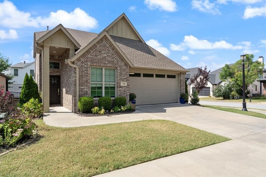 Custom-built, upscale 3-bedroom, 3-bathroom residence nestled in, gated Shadow Valley Garden Homes community. Built in 2018 by renowned builder Mark Phillips, is 2,282 sq ft. w/ gleaming wood floors throughout the main level, custom Cambria quartz countertops, custom backsplash, LED flush-mount smart lighting, & professional-grade appliances. Serene master bath defines luxury—with dual shower heads, rain shower, & twin body sprayers. Interior touches include cathedral ceilings, a gas-log fireplace, central vacuum, built-in features, blinds, and wired-for-sound infrastructure. A generous attic space presents the exciting possibility of adding a 4th bedroom or bonus flex room.  Corner lot faces east and features a fenced backyard, a covered patio, & scenic golf course views. Shadow Valley HOA brings world-class community amenities including a golf course, clubhouse, fitness center, pool/spa, & tennis courts. Home in Bentonville School District.