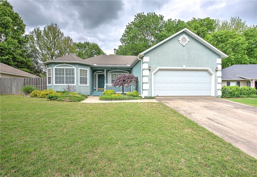 Enjoy East Fayetteville living in this beautiful 1734 sqft, 3 bedroom 2 bath house in the Crossover Heights Subdivision. Close to Vandergriff Elementary School and the Vandergriff Bicycle Course! This home has a new Lennox AC unit and Lennox gas furnace, 6/2025. The Water Heater was replaced 3/2018 and the roof is about six-eight years old. The kitchen has an electric stovetop and oven, dishwasher, garbage disposal and refrigerator. The dining area is connected to the tiled living area with a gas log fireplace. Go past the pantry to the carpeted second living area and the bay window. Down the hall to the three bedrooms, you find the Primary bedroom with a gas log fireplace and a walk-in closet. The Primary bath has a jet tub, two sink vanity and a walk-in shower. The other two bedrooms share a bath with tub/shower combo. Outside you find a treated front lawn with landscaping, trees and shrubs. In the wood fenced in back yard is a running water, rock fish pond, landscaped beautifully.