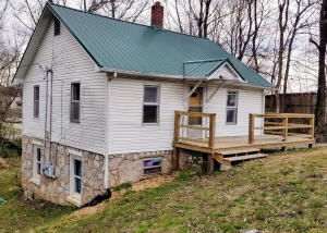 This duplex has undergone extensive remodeling inside and out. Upstairs unit ''A'' is 2 bedroom, 1 bath and rents for $450. Down stairs unit ''B'' is 1 bedroom, 1 bath and rents for $350.00. Both units have the same amount of heated/cooled living space (675 Sq. Ft.) for a total of 1,350 Sq. Ft. Tenants pay their own utilities. Need advance notice to set up showing as both units are rented.