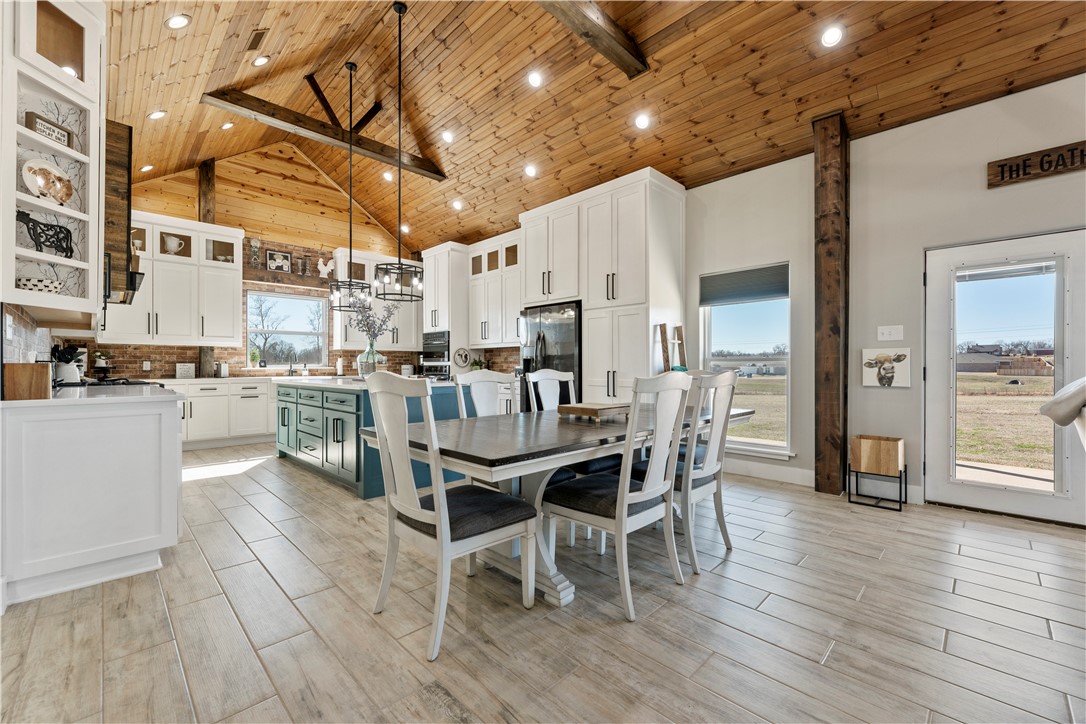 OOOHHHHH THE POSSIBILITIES.
Spectacular Property just 3 miles from XNA. Craftsmanship and details are Abundant. Chef's kitchen with large 8x4 Island and Zline Professional 6 burner gas cooktop. Gaze at the Colors of the Sunrise and Sunset from the wrap around porch. So many Family Memories to be made around the huge firepit. 4.5 level acres with all utilities makes a great place for a little elbow room or a home-based business. House & 4.5 acres +/- to be surveyed off before closing. Additional adjoining acreage can be purchased. Subject to lot split approval by City of Highfill. Washer, Dryer and Refrigerator Convey. You don't want to miss this one. WELCOME HOME!!!!