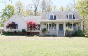 COUNTRY LIVING AT ITS FINEST! This 4BR/2BA home w/ 2-car attached garage & over 2,000 sq. ft. sits on 3.6 park-like acres! Detached & Heated, Workshop has 2 car covered carport area & new roof! Interior boasts a Large Kitchen & Utility Room w/ tons of shelving & storage space & a Big Living Room w/ large bay windows! Property has a large garden spot w/ garden shed & a 14' covered RV carport.