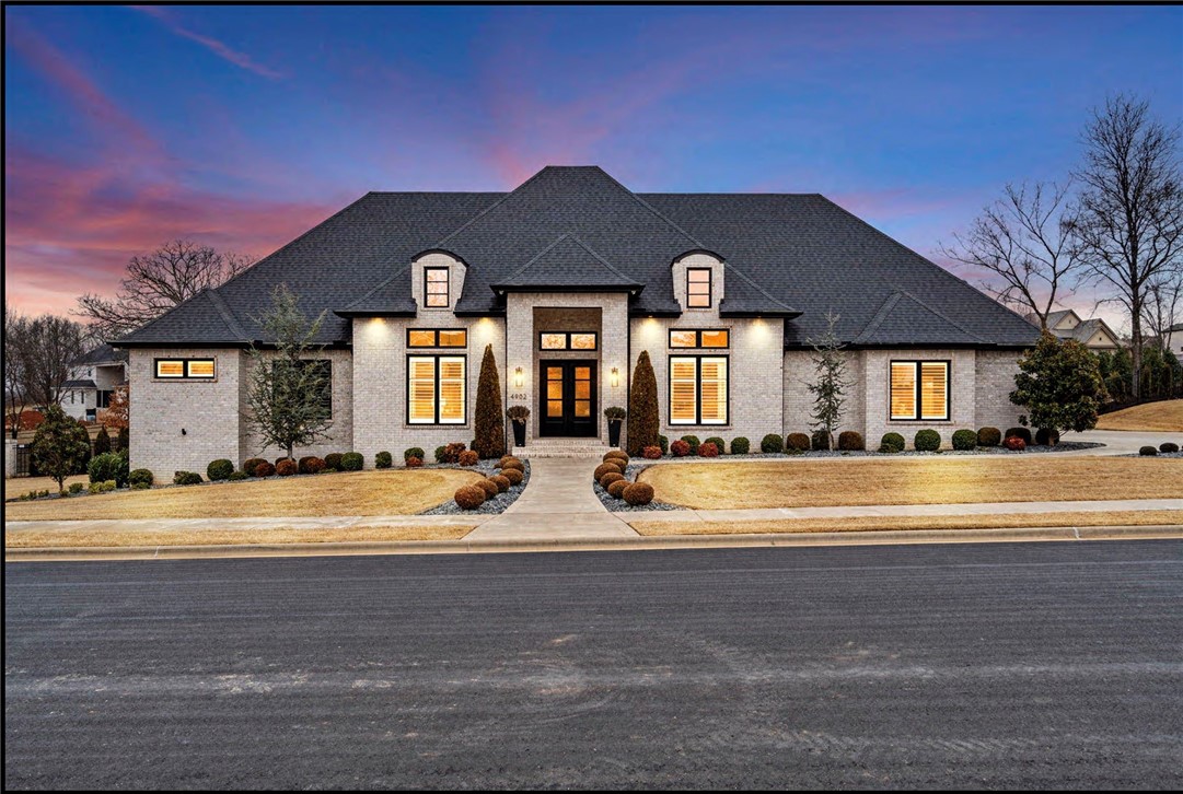 Discover resort-style living in this custom designed luxury home, nestled on a pristine one acre estate lot in the gated Estates at Southgate subdivision. This one level 4,750 square foot estate is thoughtfully crafted with high-end finishes, modern comforts and every imaginable amenity including whole-house generator. Stunning outdoor living area with in-ground pool, grilling area and cabana with stone fireplace.