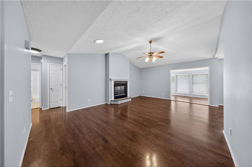 Come see this ranch style home ready for a new family!  New roof in 2021, 
2 sided gas log fireplace can be easily converted back to wood burning if desired. Nice sunroom for relaxing plus room for crafting or office space it's lined with windows to bring the outdoors in.  Upper balcony for grilling and entertaining with stairs leading onto the lower deck to meditate in the cool shade of the beautiful oak trees. Square footage shown includes the heated & cooled sunroom.  More photos coming soon!!