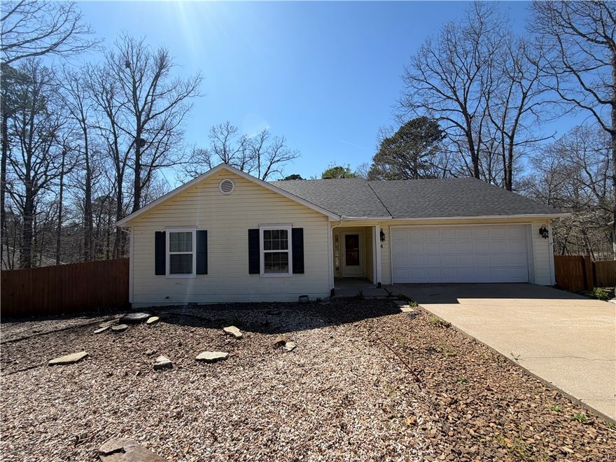 Come see this ranch style home ready for a new family!  New roof in 2021, 
2 sided gas log fireplace can be easily converted back to wood burning if desired. Nice sunroom for relaxing plus room for crafting or office space it's lined with windows to bring the outdoors in.  Upper balcony for grilling and entertaining with stairs leading onto the lower deck to meditate in the cool shade of the beautiful oak trees. Square footage shown includes the heated & cooled sunroom.  More photos coming soon!!