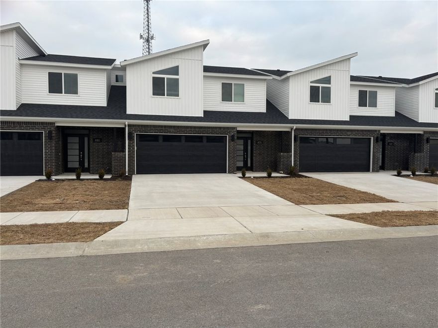 brand new This 3 bed 2 1/2 bath plan has an open living concept with tall ceilings and tons of natural light. Kitchen has granite countertops, stainless appliances, a large pantry, and a gas range. Primary suite is on the main floor and has a beautiful walk-in shower and a large walk-in closet. Two bedrooms upstairs with a full bath and landing area. Wood look tile in the main living areas, 2" faux wood blinds, Property has a private back patio and wood privacy fence.