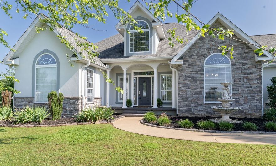 Beautiful country home on 3.32 acres. This one-level split floorplan home has Brazilian cherry and oak flooring and cathedral ceilings. The master bath has radiant floor heating, 6 nozzle luxury shower and jacuzzi bath. The kitchen opens to the living room which opens to a spacious sunroom. The sunroom leads to an incredible outdoor entertaining area with a fireplace, built-in gas grill and refrigerator and dual waterfall fish pond and water feature. There is a 2-story insulated barn/shop with 2 lean-tos on the back of the property.