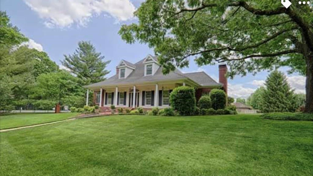 GORGEOUS SOUTHERN TRADITIONAL BEAUTY ON BREATHTAKING 0.61(+/-) ACRE LUSH LOT ON PRIVATE CUL­DE-SAC IN THE ESTABLISHED HANOVER SUBDIVISION JUST 2.7 MILES FROM DOWNTOWN BENTONVILLE AND MINUTES TO PARKS, TRAILS AND 1-49! 4 Bedroom/3.5 Bath traditional interior features hardwood flooring, custom built-ins, crown molding, granite and more! Formal living and gorgeous sunroom share a dual sided fireplace. Formal dining with grand staircase, eat-in kitchen with hearth room, main level master suite, large front wrap around covered porch, 2 side patio and large flat backyard! An absolutely gorgeous and private setting that can't be beat!