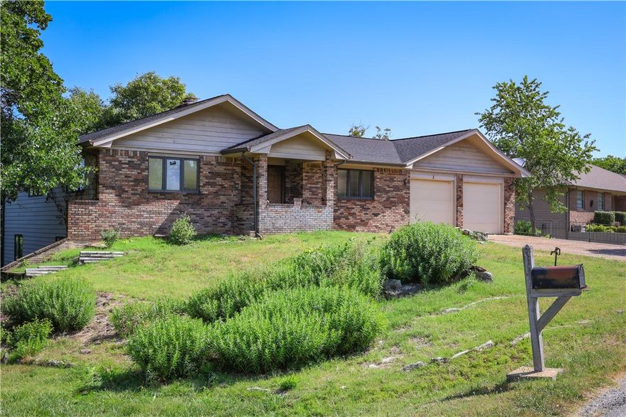 This beautiful home is located on the crest of the Ozark Mountains in Holiday Island next to the 18-hole championship golf course with panoramic views surrounded by mature trees and perfectly manicured greens. Featuring spacious rooms with vaulted ceilings and lots of windows allowing in ample natural light, a cozy fireplace in the living room, lots of storage, workshop area, an in-home storm shelter, oversized two car garage and a four seasons sunroom off of the kitchen leading to the back deck. You don't want to miss this opportunity to live near the endless entertainment Holiday Island has to offer, including, the nearby shopping center, restaurants, Table Rock Lake, the Holiday Island Community Center where you can enjoy a pool, tennis courts, pickleball, mini golf, 9-hole executive golf course and so much more. 
New roof.