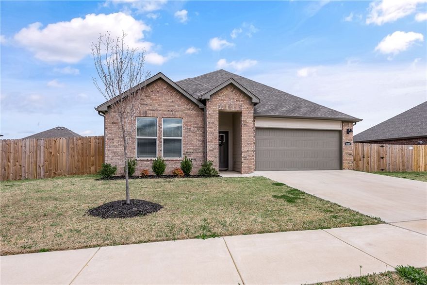 This is a fantastic opportunity to own a newer home with great value.  Seller offering $2,000  toward closing cost.  This 4 bedroom 2 bathroom home was built just 2 years ago. This one-level home offers a split floor plan- perfect for comfortable living.  Other features include luxury vinyl plank flooring throughout, quartz countertops, a kitchen with a large island and pantry.  The kitchen is open to the living room.  Living room features an electric fireplace. Bathrooms also feature quartz counter tops and double sinks.  The primary bath has a beautiful tiled shower.  Other features include a tankless hot water tank, and a large separate laundry room.  Located in Pea Ridge which still has the small town feel, but is just minutes from Bentonville, Rogers, the Wal-Mart home office and more.