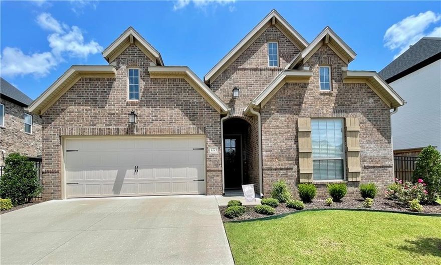 Beautiful Buffington home in the fantastic upscale subdivision of Brighton Cottages amenities included in Bentonville School district. This 3 bedroom 2 bath home has a bright open floor plan. The kitchen with big island and lots of counters space, large pantry and gas stove. The primary bedroom is very spacious with bayed window. The primary bath has a jetted tub, walk in shower and a great walk in closet. Refrigerator (different than pictured) and washer dryer to be provided. Carpet in bedrooms and gorgeous wood flooring throughout. A terrific covered back patio with a spacious yard, lawn care/ landscaping provided. Lawn sprinklers timer set by HOA. A desired location with its proximity to schools, community clubhouse, park, and pool. Located near Bentonville Community Center. Minutes from Osage creek bike trail. Owner to manage with approved application.