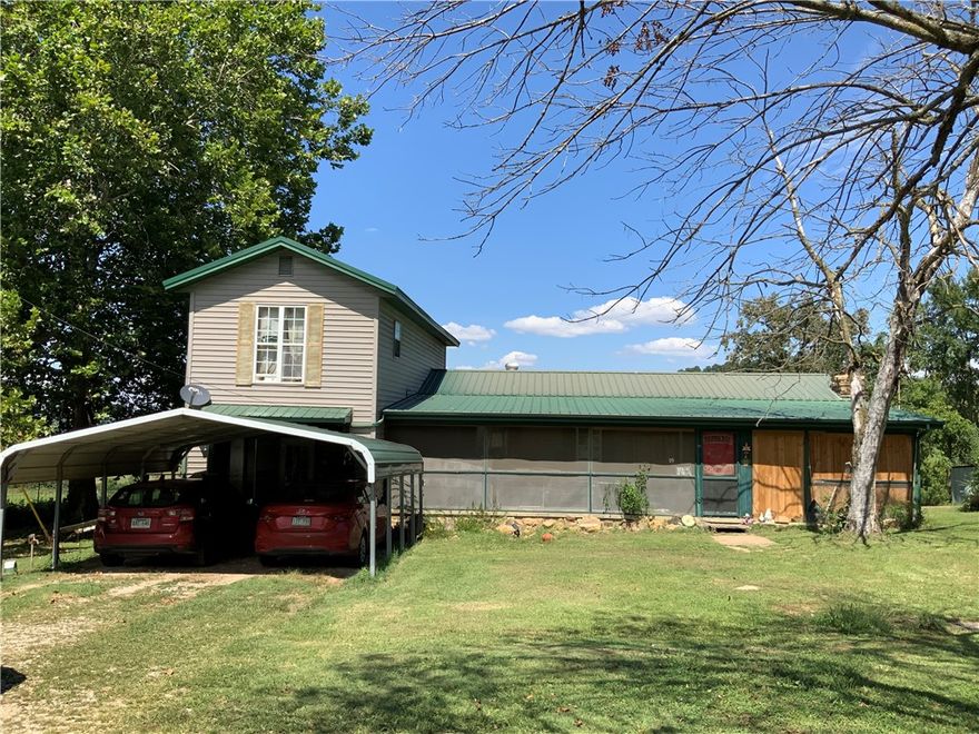 What a peaceful country setting for this home and shop building on 1.36 acres! The 1900 sqft +/- home contains 4br/1ba, roomy open living space, bonus sitting area, large laundry, and handy mud room entry. Enjoy the wide screened in porch, lots of shade trees, and wonderful views. Find plenty of room for work or hobbies in the 24x30 metal shop building with concrete floor and power. The covered carport, in-ground storm shelter, well water, and numerous sheds are added features. Easy drive to pavement and necessities. Lots of potential in this property! Make it your own! Utility availability is the responsibility of the buyer or buyers agent.