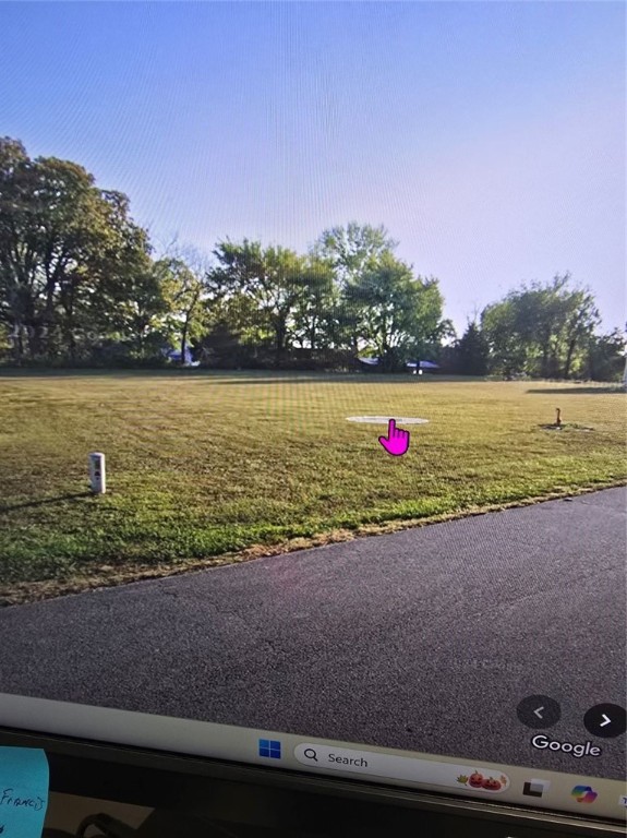 Level half acre lot in Bergman School District on pavement with water and electric in place. Natural gas available.