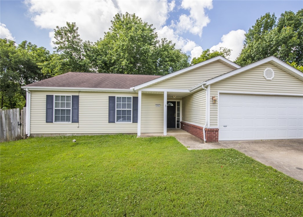 Great home in Fayetteville. Just remodeled. All new paint, wood style flooring thru main living area and carpet in bedrooms. Fireplace in living room, Granite counters, refrigerator included, painted cabinets, large fenced back yard 2 car garage