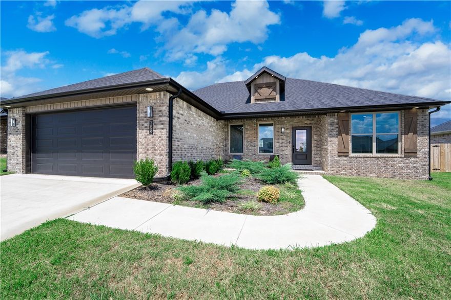 Step into this immaculate 3-bedroom, 2-bathroom home, newly built in 2024 and designed for modern comfort. Featuring 1,713 square feet of well-planned space, this home showcases a classic brick exterior, an open living area with vaulted ceilings, and luxury vinyl plank flooring throughout.

The kitchen is a standout, offering a large island with granite countertops, along with ample cabinets and drawers for extra storage. A split floor plan provides privacy and functionality, while custom built-ins throughout add convenience and charm.

Located just 10 miles from the University of Arkansas, this home offers easy access to campus, shopping, dining, and entertainment — making it perfect for faculty, students, or anyone seeking a short commute to Fayetteville.

Don't miss the opportunity to own this move-in ready gem!
