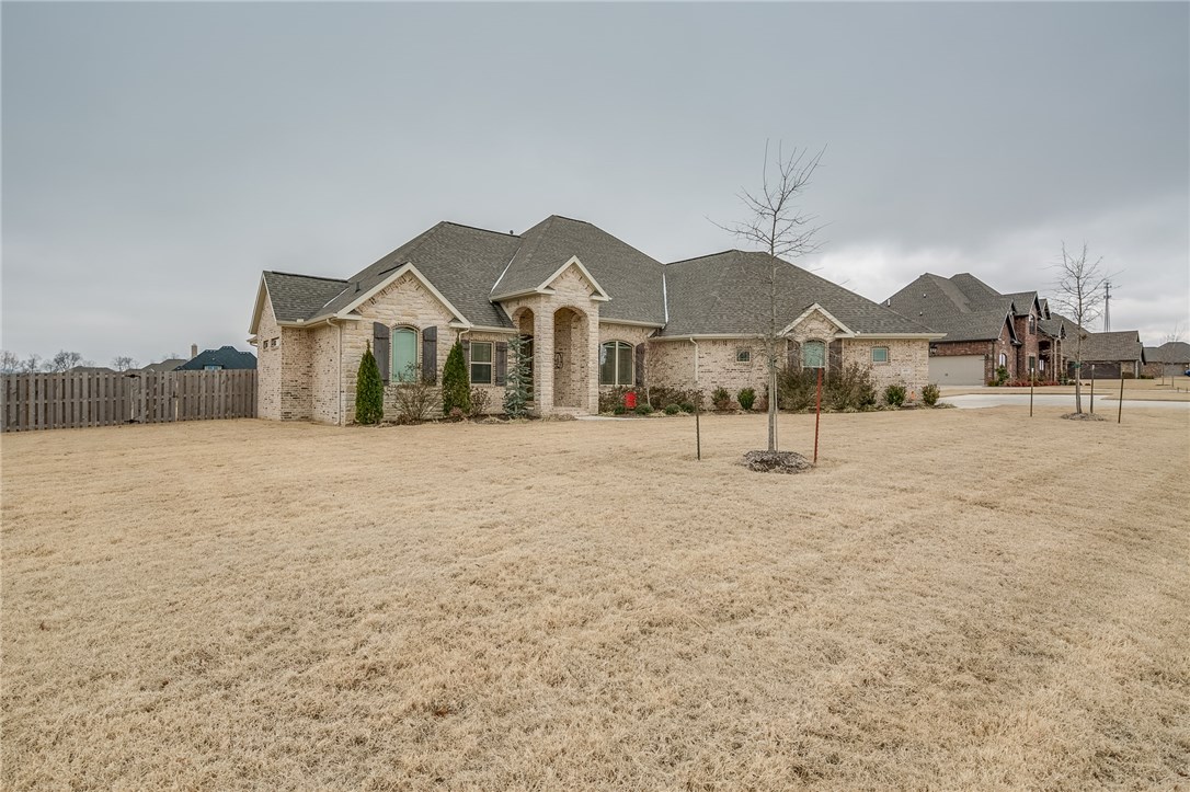Custom built home with attention to functionality & elegance. Large inviting entryway opens to a warm open family room with gas fireplace & large windows that transcend to outdoor patio and pool area. The Chef's kitchen has electric double ovens, gas cook-top, large walk-in pantry & lots of custom cabinetry. The large master bedroom flows to the bath, to a large walk-in closet with built-ins to the laundry room. Large guest room with large bath and Jack & Jill bedrooms. The home features 3 car garage, home generator, safe room, security system, surround sound, formal dining, pool, central vacuum, and 1 acre lot.