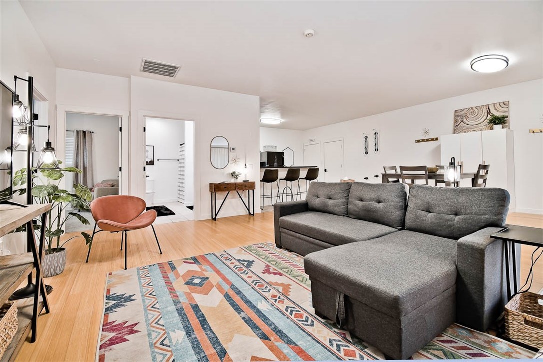 Monthly rent includes ALL utilities-Wifi too! Completely remodeled fully furnished 2 bed 1 bath apartment. Live, work and play all in this amazing location. Only a short walk or ride to all local hot spots-Pedaler’s Pub, Hub Bike Lounge, The Square, Momentary, 8th street market, Walmart offices and so much more. This apartment features all appliances included with washer/dryer in the unit and a bright open floor plan, private redone deck and access to the complex’s inviting courtyard. Applicants go to elevationrm.com and click on Available Now to apply.