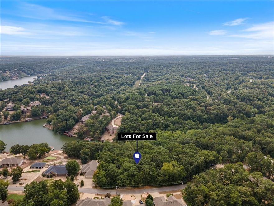 Step right up Ladies and Gentlemen for what might be your last chance to own land at the end of a cove on Loch Lomond.  It's crazy how I can hear an old Carnival Barker shouting the same thing.  With Bella Vista being what I think is the best kept secret in NWA, these two lots at over 1 acre total really are compelling.  Located at the end of a cove, privacy and seclusion are paramount, and located on the lovely Stonehaven, this really packs a lot of cachet.  With both lots perc tested, one large home could be built or could even build two separate homes, maybe housing multiple generations, close but bearable if there is any drama.  Hurry, hurry, hurry, come see the Greatest show on Stonehaven today!  Come one, come All.
SEAWALL BUILT ALREADY, READY TO BUILD A DOCK!