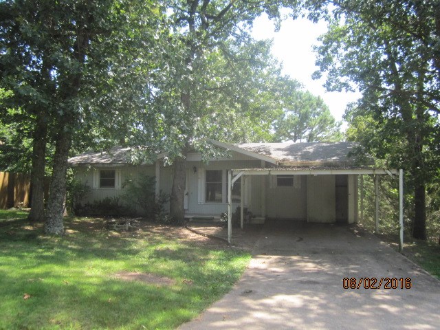 This is a great home! Three full bedrooms, and two baths, with a giant Bella Vista Room on the back that overlooks the woods. Very functional floorplan, great deck for entertaining, and the two living areas are a great amenity! This foreclosure is sold AS-IS, WHERE-IS, No Warranties, No Repairs, and No Representations of Actuality are offered or implied. Buyer to satisfy any and all concerns BEFORE Closing.