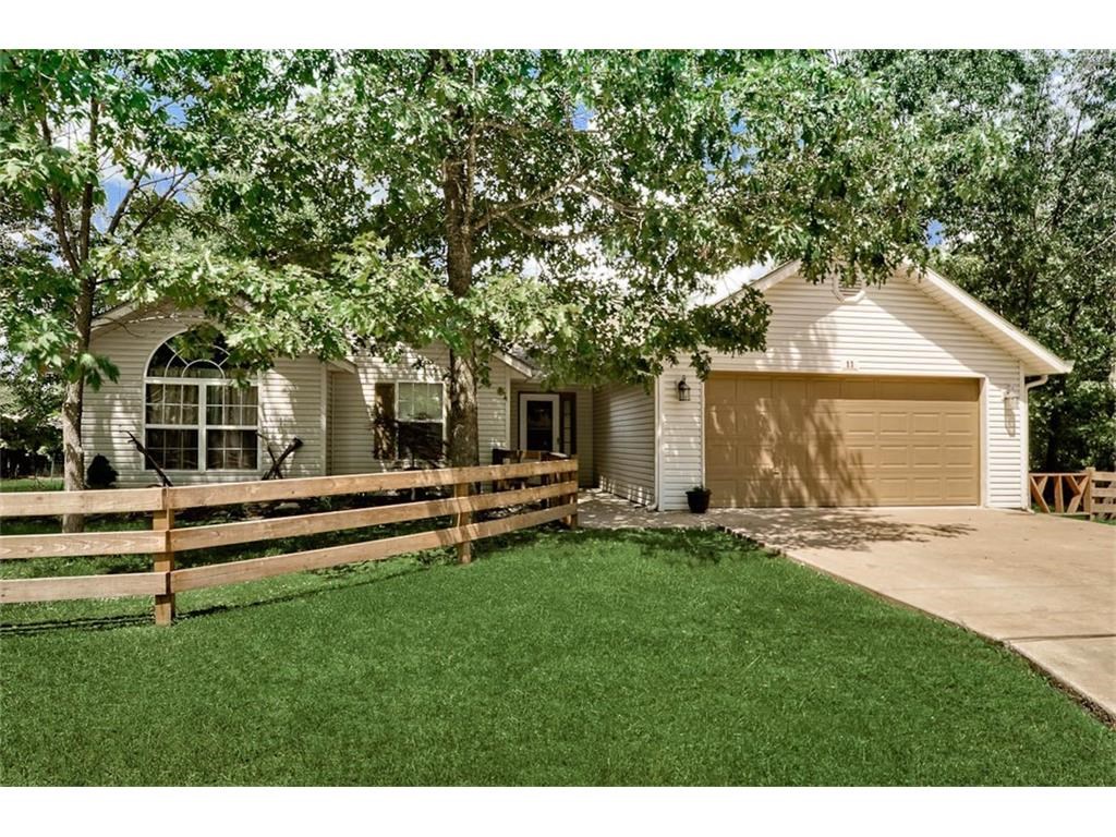 3/2/2 home on a half an acre mostly wooded lot. Open floor plan with stainless steel appliances, large rooms, and a large covered back deck overlooking the yard. Comes with refrigerator.