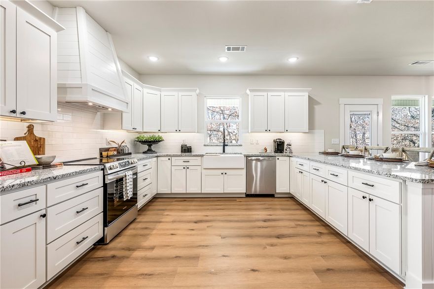 Don’t let the address fool you! 10101 Raindrop is the perfect location hack. You get the Bentonville lifestyle without the price tag & NO POA! Whether jumping on the bypass (10 mins) or heading to Walmart HQ (20 mins), dropping kids at Bentonville West H.S. (15 mins), or jetting off from XNA (21 mins), you are close to the action while still enjoying the stars! From the moment you pull up to this 1-acre beauty, it’s all welcome home energy! Think cozy mornings on the back deck & hosting epic game nights in the 2nd living room. This new construction home is about unlimited space & smart design with 4 beds, 4 baths, a 3-car garage, & a dedicated office! With two living areas, oversized bedrooms, & storage for days, it’s a total dream. Between the incredible walk-in pantry, mudroom, & easy-access walk-in attic, you’ll have a place for everything! $4,000 Preferred Lender Credit. Move-in ready. See it before someone else lives your dream! Buyer to verify attendance at Bentonville Schools via School Choice: 479-367-8050.