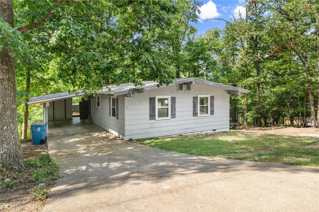 Investors, First time home buyers, Air B&B owners take a look at this. Close to the Back 40 trails and Lake Rayburn. Just a few minutes to all Bella Vista has to offer. Beautiful Serene view from the back deck. Make a studio apartment on the lower level with a separate entrance. Don't wait. Take a look. Property sold "as is."