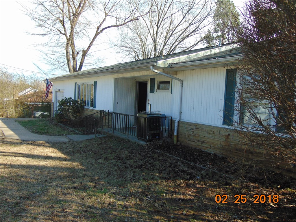 With a little TLC, this 3 bedroom, 3 bath home would make a nice rental in a family friendly neighborhood. Part of the basement is finished with a bathroom and bedroom. Upstairs, are bedrooms with an extra room off the master that could be made into a play room or office. Was once used as a hunting display room. The lot is over a half acre with a fenced back yard. Nice wood deck on main floor. 1398 living space upstairs and basement is 1398 sq. ft. heated area partially finished.