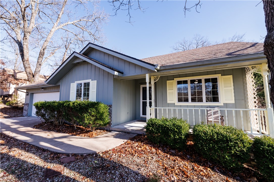 Welcome to 17 Farnham Dr in Bella Vista, AR! This beautifully updated home offers 1,665 square feet of thoughtfully designed living space in a stunning mountain setting. The home features 3 bedrooms and 2 full bathrooms, creating a perfect retreat for comfortable living.
Step inside to discover new flooring throughout and updated lighting that complements the abundance of natural light streaming through classic wooden-cased windows. The home's open layout creates an inviting atmosphere while preserving charming original details. The expansive back deck provides a perfect vantage point to enjoy the peaceful hillside forest views.
Located in a picturesque mountain neighborhood just 3.2 miles from the Bella Vista Recreation Center, this home perfectly balances natural serenity with convenient access to community amenities. Whether you're enjoying morning coffee on the deck or taking in the forest views, this property offers the ideal setting for those seeking a peaceful mountain lifestyle.