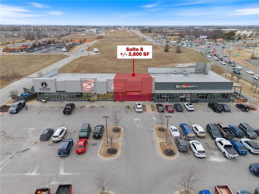 This prime +/- 2,800 SF retail space in Bentonville offers an exceptional opportunity for businesses seeking high visibility and foot traffic. Located off Walton Blvd, which sees approx. 36,000 VPD, this suite is also near Rainbow Curve, a major intersection with an average of 27,000 VPD. Nestled within a bustling multi- tenant center, this suite shares a building with popular local businesses like Ozark Mountain Bagel Company and Big Whisky's restaurant, ensuring a steady stream of potential customers. Currently occupied by a retail store, the suite features a spacious retail floor, abundant natural light, and ample window space to showcase your business. Signage opportunities on front and back of the building, as well as the entrance door. Offered on a NNN lease, tenant is responsible for all utilities, prorata share of trash, gen liability, prorated portion of taxes, property insurance, and CAM. A minimum 4-year term is required. Don't miss this prime retail opportunity in one of Bentonville's busiest areas!