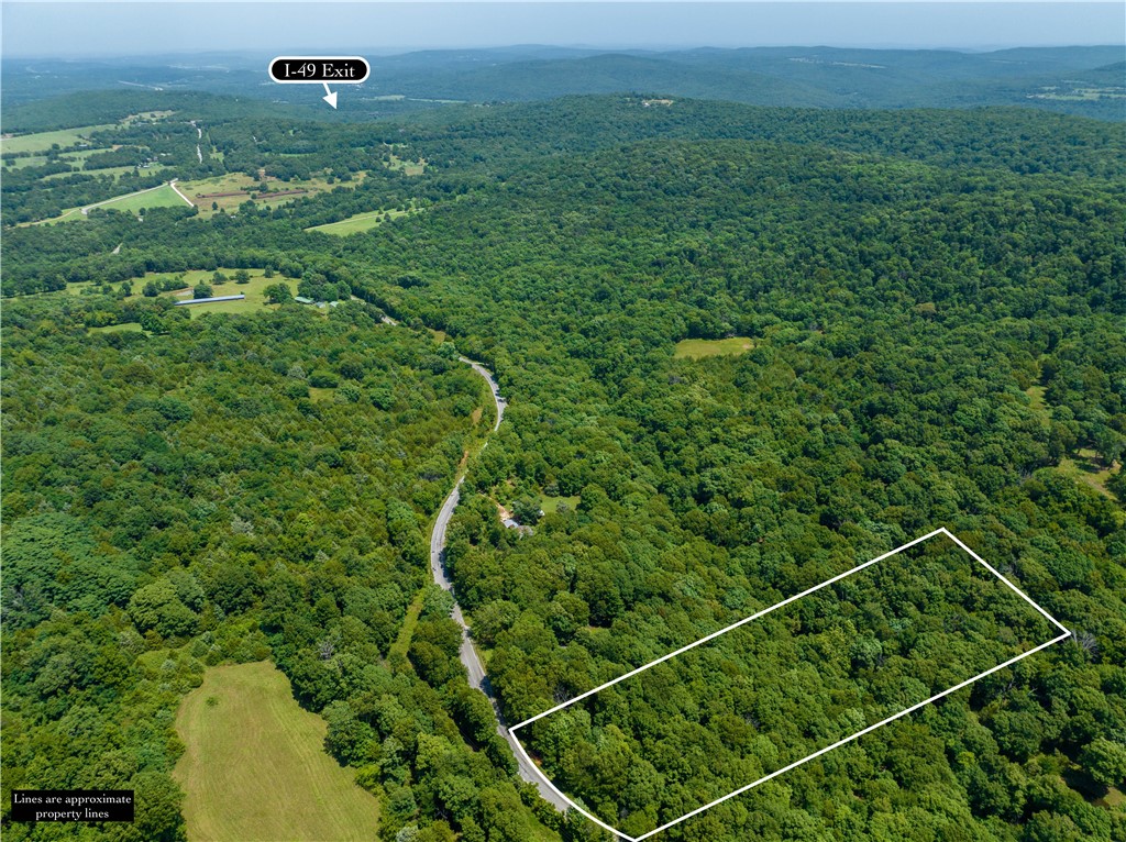 Welcome to this fantastic 4-acre piece of land, where convenience and serenity meet! Located just 5 minutes away from the easily accessible I-49 and a 15-minute drive to Fayetteville, this property offers the perfect balance of accessibility and privacy. Imagine building your dream home on this great buildable lot. The convenience doesn't end there ā a water tap at the road is already in place, ensuring a seamless connection to utilities. What's more, the lot has already percolated, saving you time and effort during the construction process. Don't miss out on this incredible opportunity to create your own sanctuary in a great location.