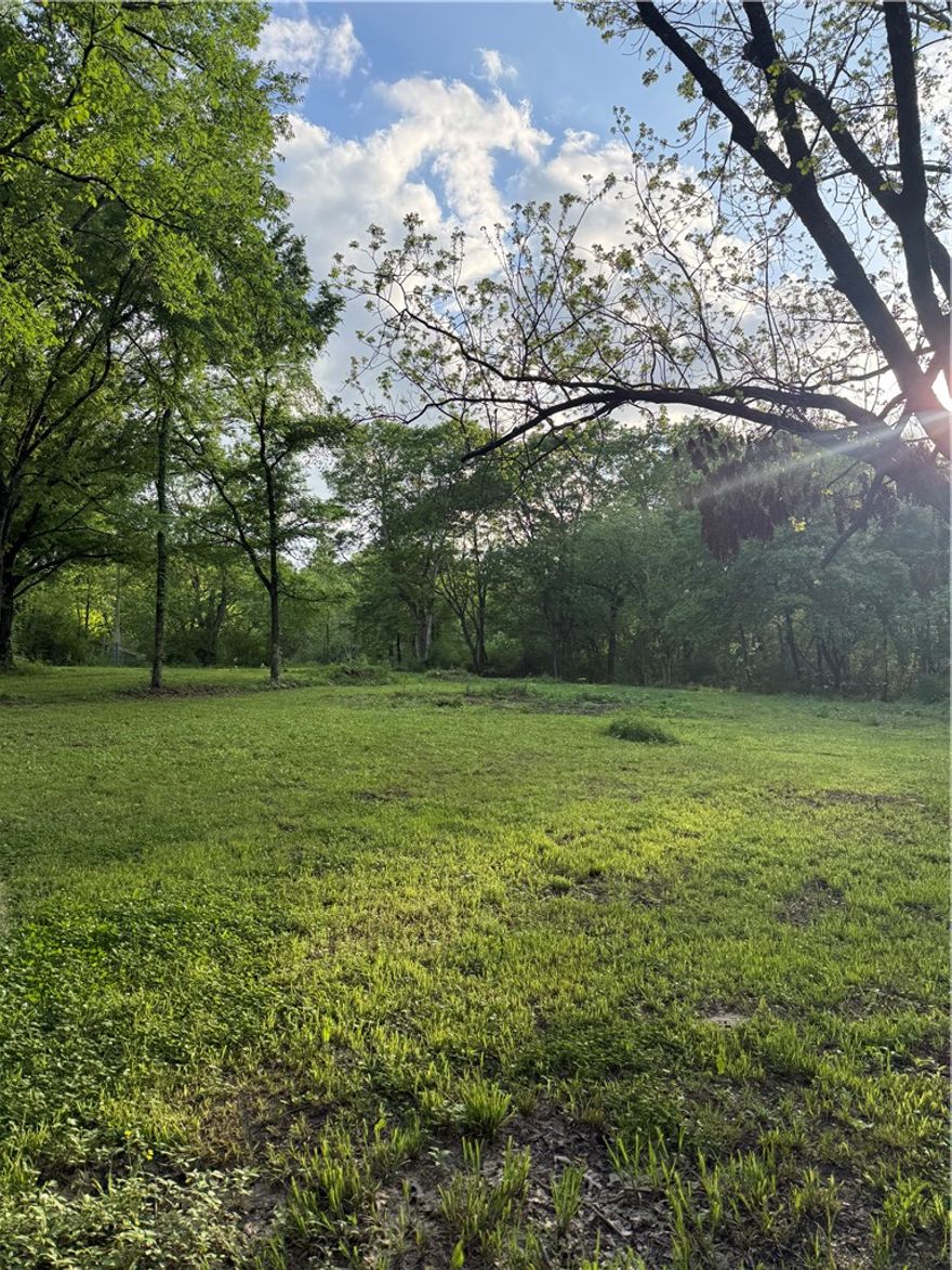 Check out this property featuring 3 lots! 
The land is clear and level—perfect for building your new home. It also includes an older home that will convey with the property.  All utilities are conveniently available at the street.