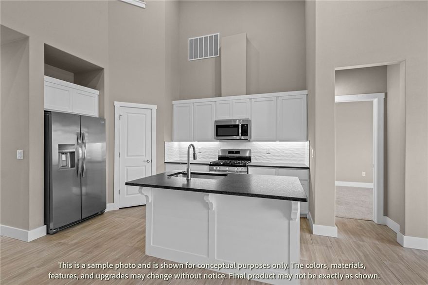 Welcome to Crystal Cove, where modern design meets everyday comfort in this beautifully crafted 3-bedroom, 2.5-bath townhome by Sunrise Homes. This ~1,582 sqft layout features a desirable primary suite on the main level, offering both convenience and privacy. The open-concept living space is highlighted by a soaring vaulted ceiling and large Clerestory Windows bringing in natural light for a bright, airy feel throughout. Also featuring a sleek electric fireplace, creating an inviting atmosphere. The kitchen flows seamlessly into the dining and living areas, perfect for entertaining. Upstairs includes two additional bedrooms, a full bath, and a loft-style hallway overlooking the main living area. Enjoy outdoor living with a covered back patio and private backyard. Low-maintenance living with thoughtful design throughout makes this home ideal for a variety of lifestyles.  Builder’s credit of $3,000 and Lenders Credit Up To $5,000 with Preferred Lender.