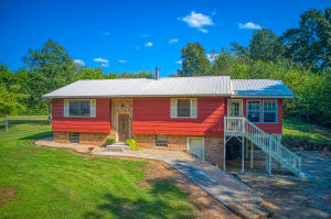 Check out this FABULOUS well kept home! Sits beautifully on 3.15 acres. HUGE trees sit in a yard big enough to hit a few golf balls on....Seriously! In the distance is a beautiful view of Boat Mountain. This 3 BR/2 BA home has a NEW HVAC installed last month,a metal roof,AND a 25 X 12 sun room to enjoy our amazing Ozark weather! Minutes from camping, the Buffalo, our lakes. Come home to the Ozarks and get ready to enjoy life!