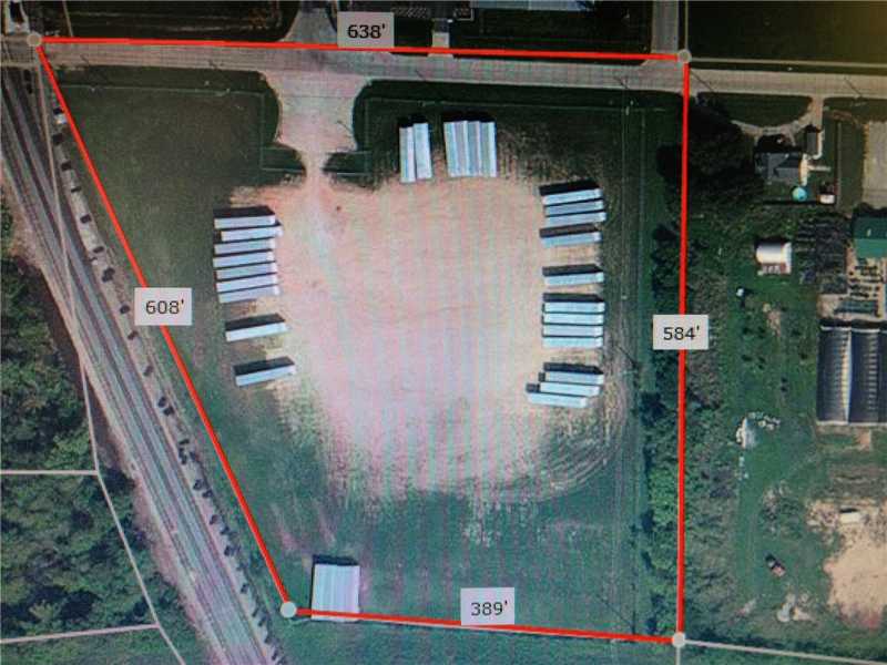 Industrial Site - fenced and gated, city utilities to site.