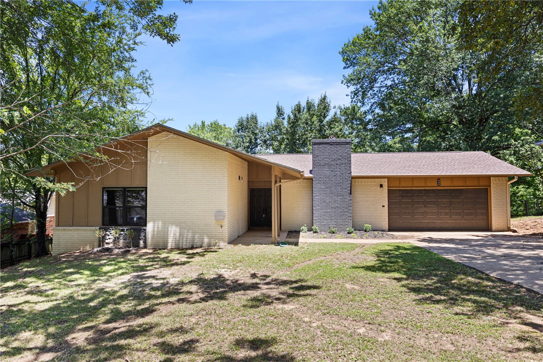 Beautifully updated 3-bed, 2-bath home in the heart of Russellville! This 1,530 sq ft home features new windows, flooring, and a brand-new HVAC system. Enjoy a spacious layout, a cozy wood-burning fireplace, and a functional kitchen perfect for everyday living. The home also includes a double garage and sits just minutes from schools, shopping, dining, and everything Russellville has to offer. Move-in ready and full of charm—schedule your showing today!