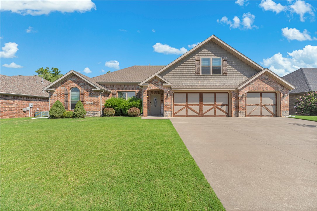Centrally located between Bentonville and Fayetteville, this home offers unmatched convenience with quick access to all of Northwest Arkansas. Inside, you'll find a spacious living area with arched doorways and a see-through fireplace, a well-maintained kitchen with granite countertops, stainless appliances, and an eat-in dining space. The large primary suite features walk-in closets and an en-suite bath, while a second-floor bedroom with its own bath provides extra flexibility. Additional highlights include a 3-car garage, ample storage, and access to a neighborhood park and pool just steps away. Don't miss this opportunity to call this beautiful property home.