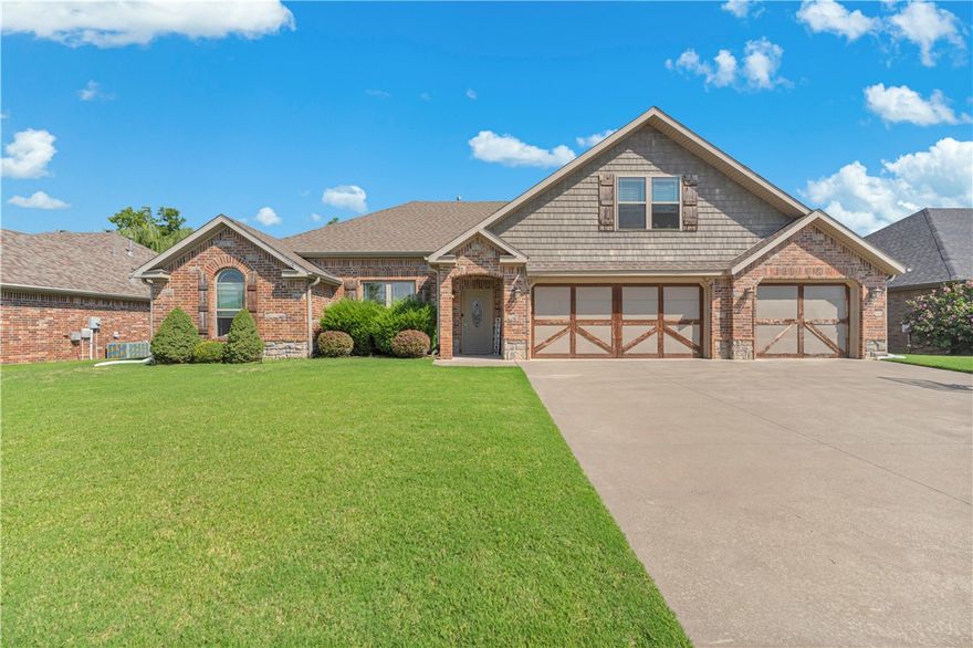 Centrally located between Bentonville and Fayetteville, this home offers unmatched convenience with quick access to all of Northwest Arkansas. Inside, you'll find a spacious living area with arched doorways and a see-through fireplace, a well-maintained kitchen with granite countertops, stainless appliances, and an eat-in dining space. The large primary suite features walk-in closets and an en-suite bath, while a second-floor bedroom with its own bath provides extra flexibility. Additional highlights include a 3-car garage, ample storage, and access to a neighborhood park and pool just steps away. Don't miss this opportunity to call this beautiful property home.