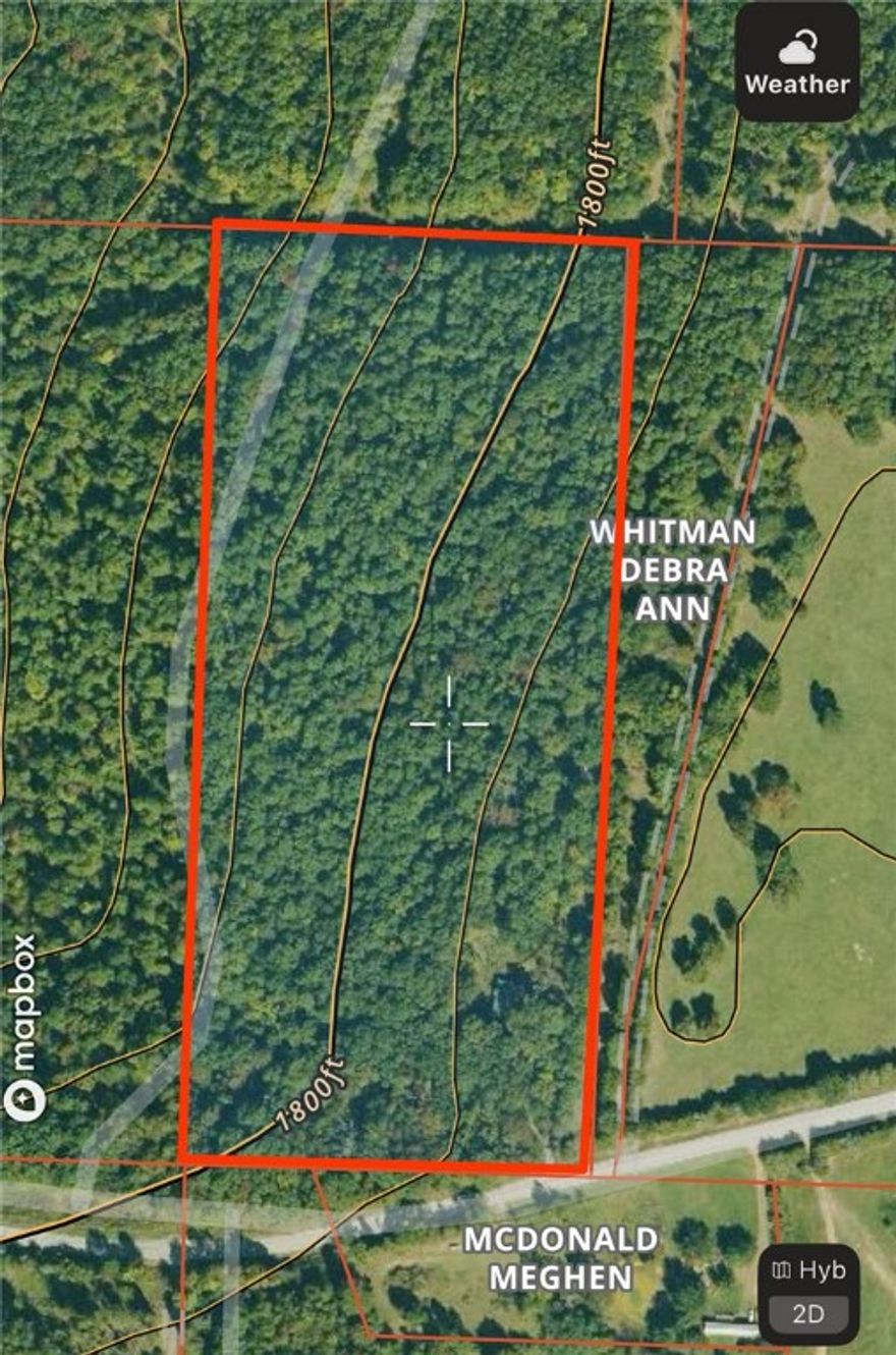 Beautifull mostly wooded 18 m/l acres with all the utilities including septic. 15 minutes south of Huntsville.