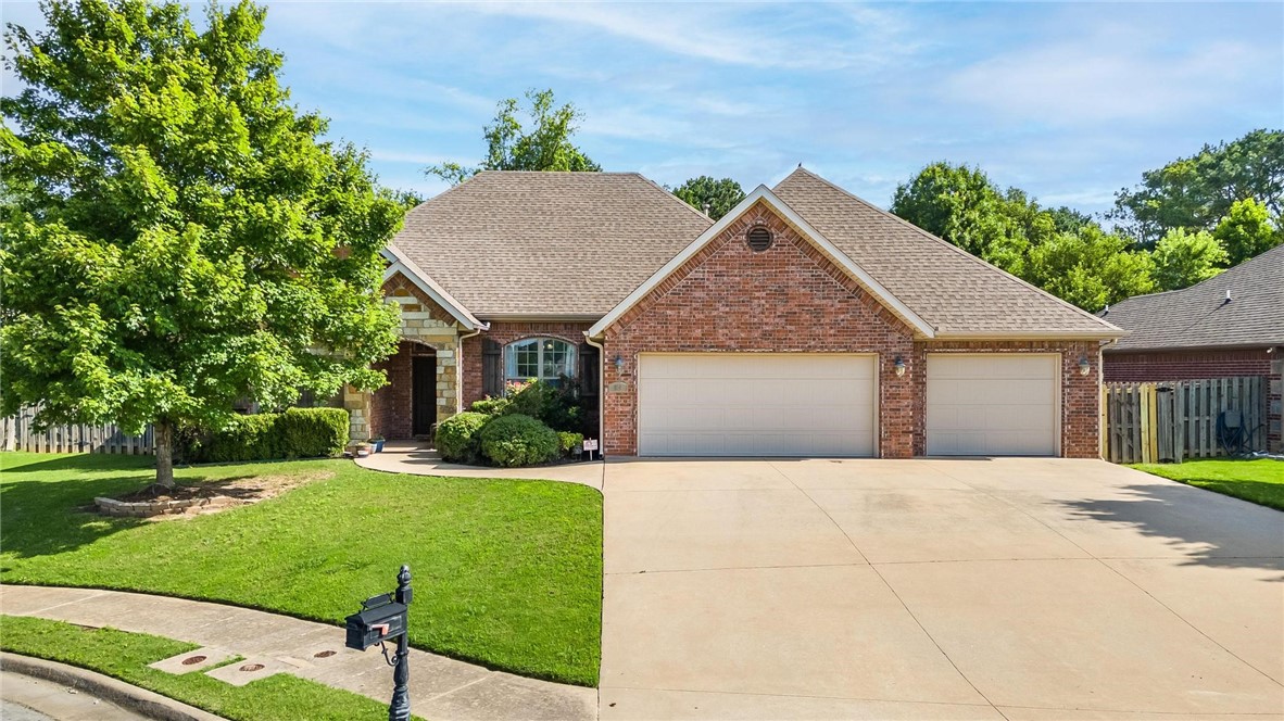Unbelievable location in the heart of NWA, gated community, a 3 Car Garage, wood floors, and an office/2nd living area are just a few of the highlights of this wonderful home! Just south of the Pleasant Grove Rd Exit this home is not far from the Pinnacle Hills Promenade and provides convenient access to JB Hunt, the Walmart Home Office, or Tyson. Roof replaced 2015. Great neighborhood with no visible neighbors directly behind the home!