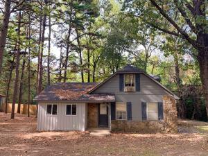 Enjoy this 4 bedroom home located on 1.37 tree shaded acres with a wet weather creek. The oversized detached 2 car garage / shop will give you plenty of space.The roof is about 3 years old, and you will love the new flooring on the main level. Priced to sell at $169,900