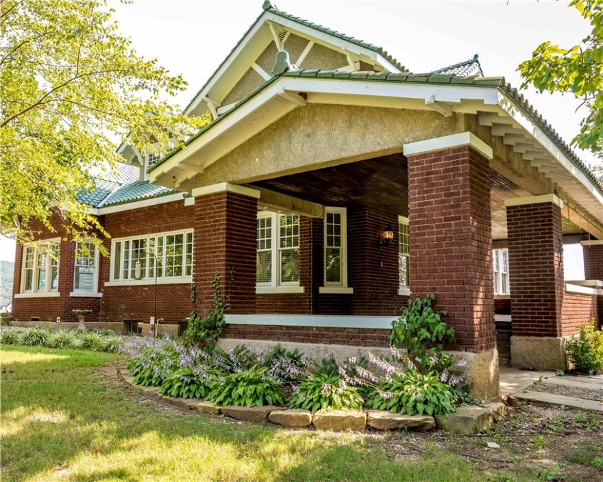 Amazing Turn of the Century historic home on 7.83 acres! Features of this unique home include 3,888 sq. ft. heated, a full unfinished basement, 5 or 6 bedrooms, 4 bathrooms and lots of storage. This home has a lot of original hardware including glass doorknobs, but it also has a lot of modern updates such as new windows, granite, real fireplace, gas cooktop, clawfoot tub, large walk-in tile shower in MBA. Even the old radiator heaters are still in place though not working. It has modern heat & air, new electrical panel, whole house attic fan and cedar-lined closets. The roof even still has the original clay tiles. Deed restriction: no mobiles. There is lots of potential with this wonderful home. First time on the market in many, many years. Also included is a nice separate 40x60 shop building.