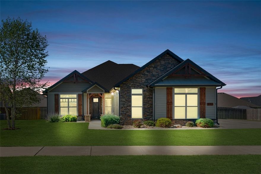 Don't miss this stunning contemporary home in the highly sought-after Big Sky Subdivision! This 4-bedroom, 3-bath beauty offers nearly 2,800 sq ft of thoughtfully designed living space with a split floor plan, open concept layout, and modern finishes throughout. The gourmet kitchen features granite countertops, gas cooktop, built-in appliances, and a spacious pantry. Enjoy the comfort of smart home technology, LED lighting, and a cozy gas fireplace in the family room. The private primary suite includes a luxurious bath with a soaking tub, walk-in shower, and oversized closet. Step outside to the covered patio overlooking a fenced backyard—perfect for entertaining or relaxing. Additional features include a 3-car garage, central vacuum, on-demand gas water heater, and energy-efficient windows. Conveniently located near Bentonville schools, trails, shopping, and dining—this home blends comfort, style, and location beautifully! Bonus: $6000 Preferred Lender Credit for qualified buyers with First Colony Mortgage.