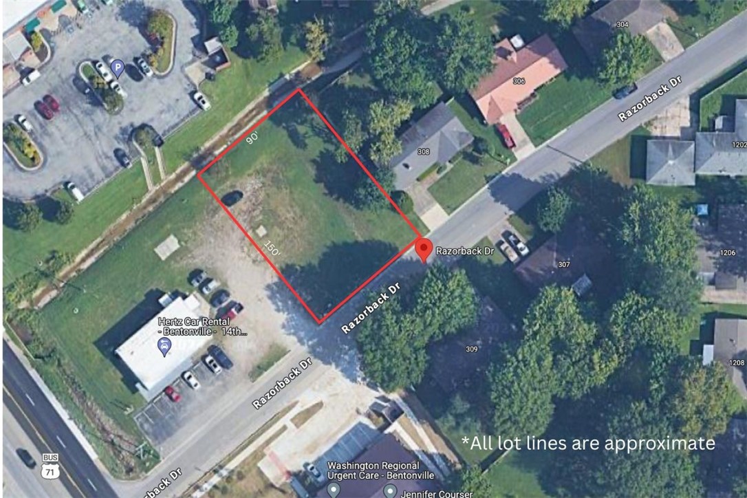 VACANT LOT, Commercial ZONE C-2. This lot is visible from Walton Blvd, just one lot between it and busy 71B. .31 acre lot. located in a flood area, it will need a "No Rise Analysis". Buildings beside, and across the street area all in the same flood area, so building is possible.