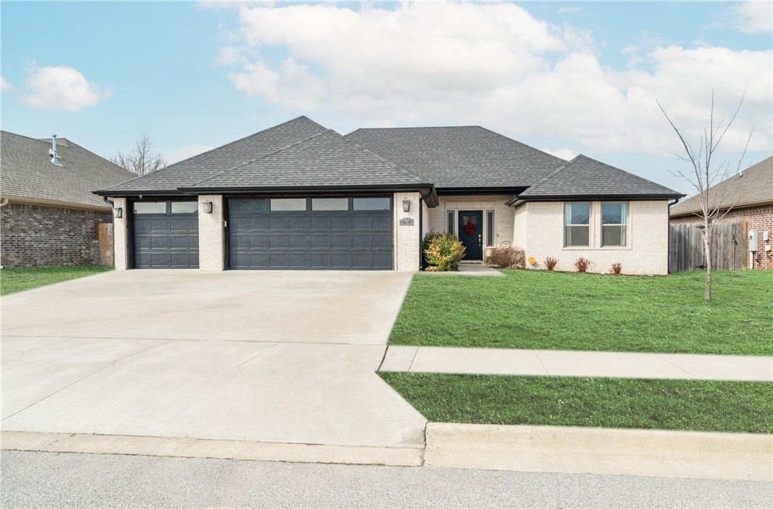 Welcome to this modern beauty, upgraded 4 bedroom, 2 bathroom home! With 1,980 sqft of thoughtfully designed living space, this new construction offers an array of upscale features and modern conveniences. Highlighted by an oversized master closet with convenient access to the utility room, carriage style garage doors, and stunning custom cabinets throughout. The heart of the home is the spacious kitchen, complete with a large island featuring quartz countertops, a butler's pantry, and a charming mud area with shiplap accents. Additional amenities include a nest thermostat, hardwood flooring, central HVAC system, and crown molding throughout (including the guest bedrooms). Outside, unwind on the large covered patio and enjoy large, level, fenced-in yard. Don't miss the opportunity to make this impeccable home yoursāschedule your showing today!