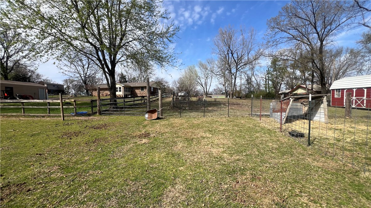 NICE 3 BEDROOM 2 BATH BRICK HOME IN RURAL AREA OF ALMA WITH A LARGE LANDSCAPED YARD, DETACHED GARAGE, FENCED YARD.