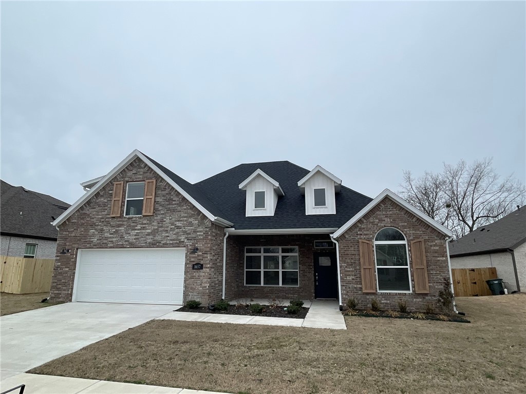 Welcome home to this stunning 5-BR, 3-BA residence with a 2-car garage. This home features a formal dining room, open floor plan, covered deck, gas log fireplace, LVP/carpet/ceramic tile flooring, and blinds adorning every window. The kitchen boasts a farm sink, granite counters, and a gas cooktop with hood ā a dream for any chef. The master BR features charming wood beams on the ceiling, creating a warm and inviting atmosphere. The master bath is a luxurious retreat with dual sinks, a tile shower, walk-in closet, and a relaxing soaking tub. Upstairs, discover the versatile 5th bedroom that can also serve as a bonus room, accompanied by a full bath. This home is a perfect blend of elegance and functionality, offering a modern kitchen, charming features like wood beams, and a well-designed layout. Don't miss the chance to make this your dream home!