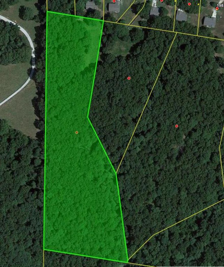 Looking for a Wooded Building Site, with City Water & Electric available? Great Building site 7.83 acres, Single frame-built home with total interior finished floor area of not less than 1200 sq ft, excluding garages. No manufactured or mobile homes shall be permitted. 5 minutes to WalMart, 30 minutes to Branson MO, 30 minutes to the Buffalo River, Buyer to verify all utilities.